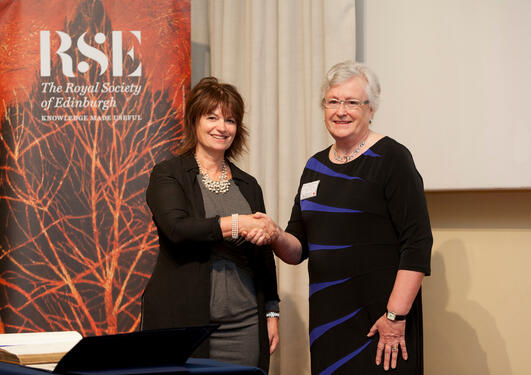 Hilary Birks (on the right) being welcomed to the Royal Society of Edinburgh by its President Dame Anne Glover (on the left)