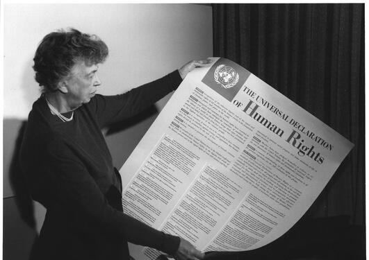 Eleanor Roosevelt holding poster of the Universal Declaration of Human Rights. 