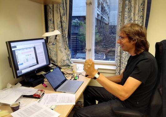 man sitting at workplace