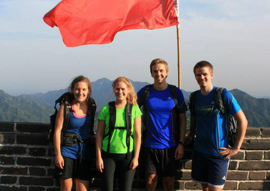 Four studens from University of Bergen at the Great Wall of China.