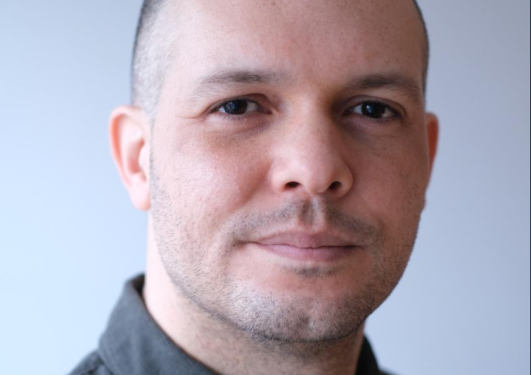 Portrettbilde av disputas Robert Matongo Persson