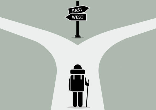 Illustration of a person standing before a crossroads, trying to decide which way to go.