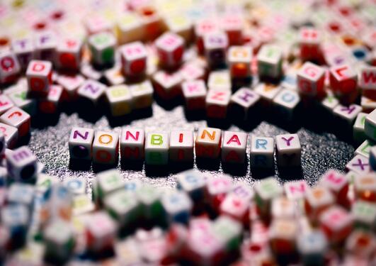 Scrabble tiles spell nonbinary