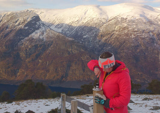 Mari Jokerud setting up the UV-B recorder at Høgsete