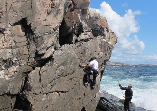 EvoClimbing - here Andria on his way up, and Mikko belaying